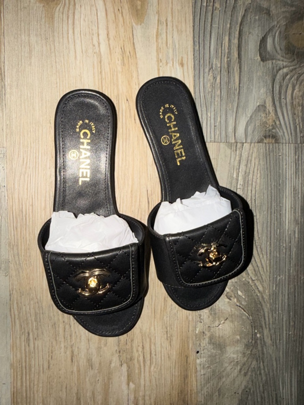 CHANEL Black Quilted Slide Mules with Gold CC Accent